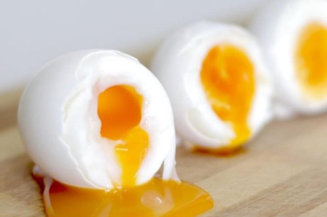 Poached eggs with liquid yolk — protein and vitamin rich breakfast